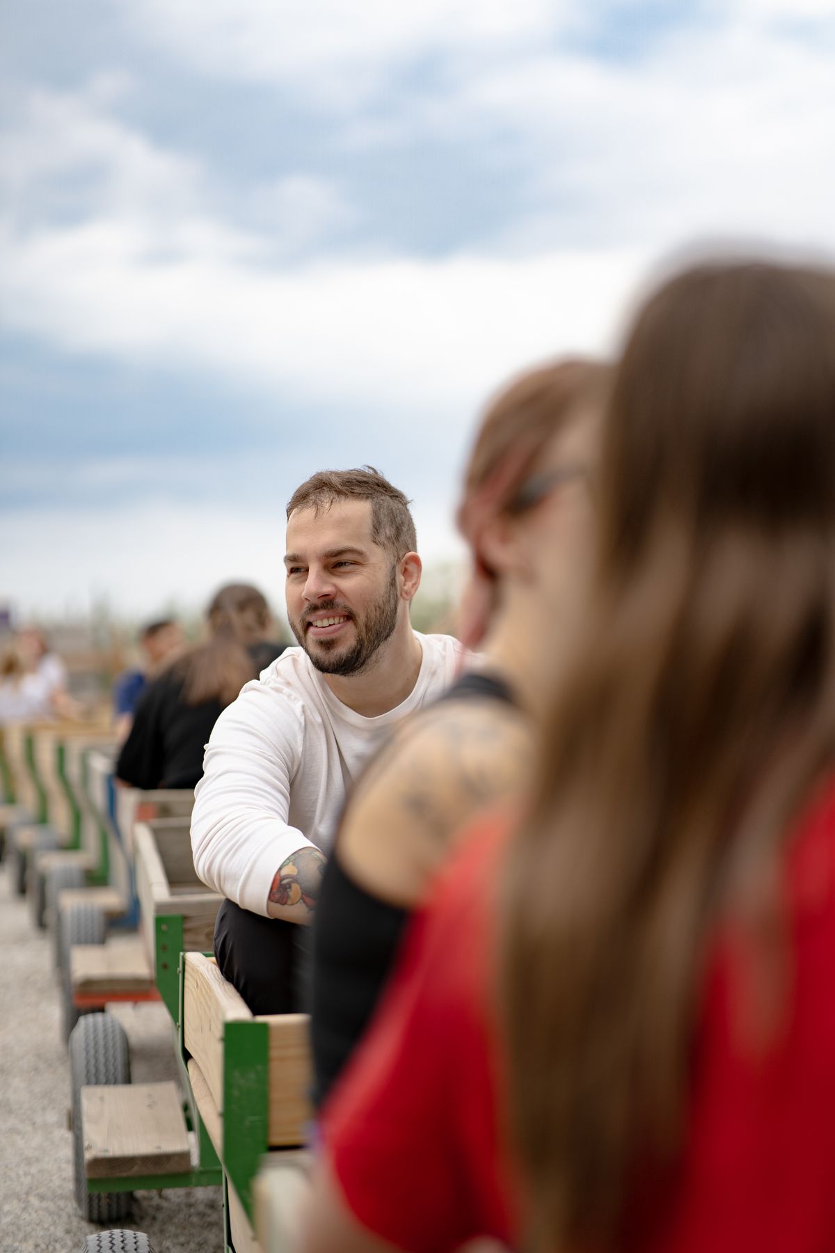 Candid portrait of a man smiling during a farm outing